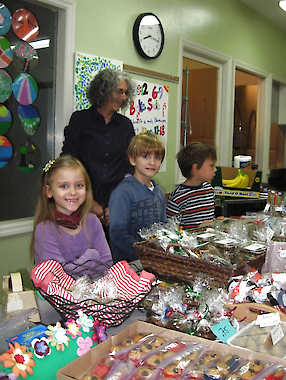 Courtesy photo. From left, are Bloomington Montessori School students Braelyn FitzSimmons, Aidan Ball and Cyrus Visser. Also shown is head teacher Amy Lifton.